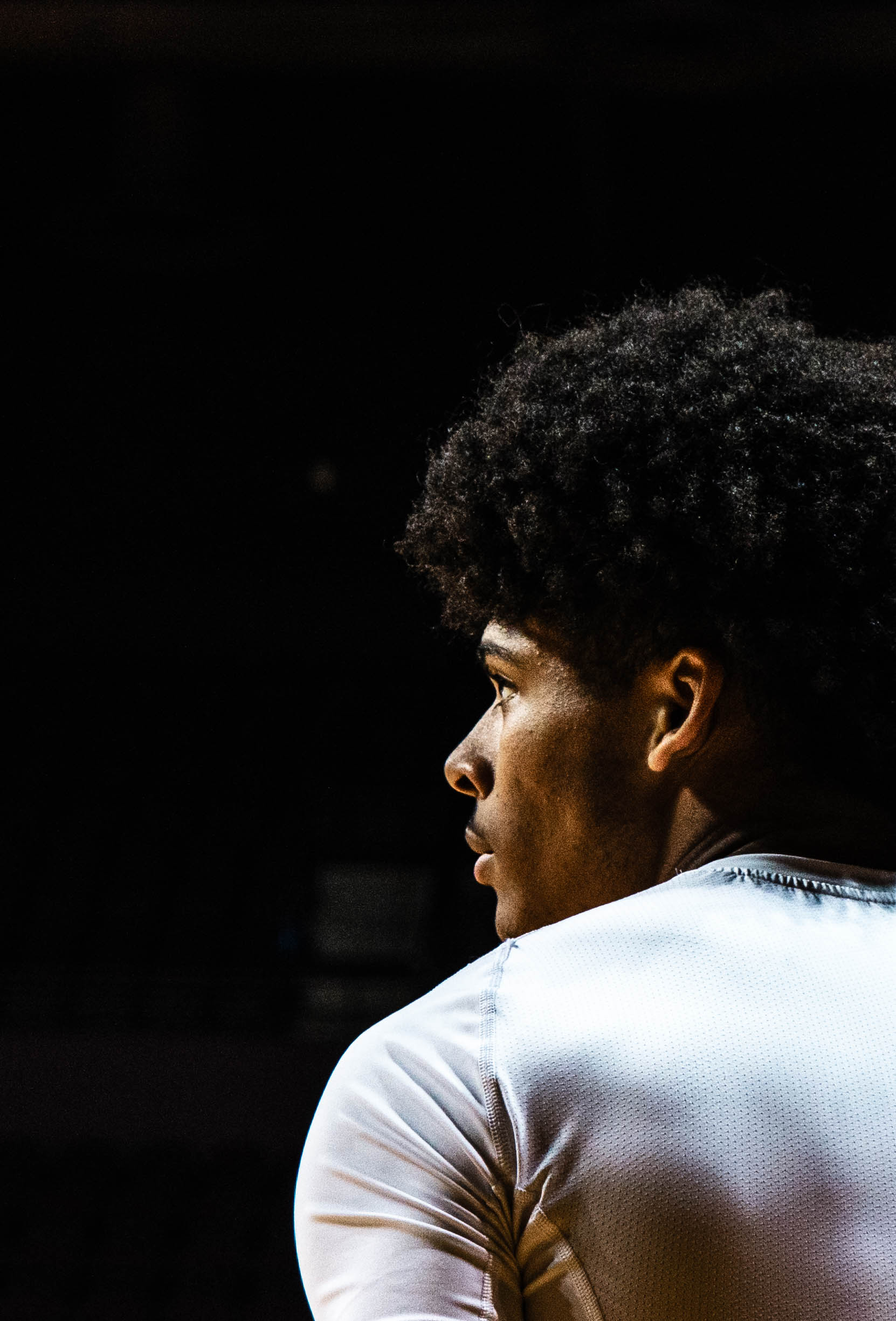 This is a basketball player's side profile.