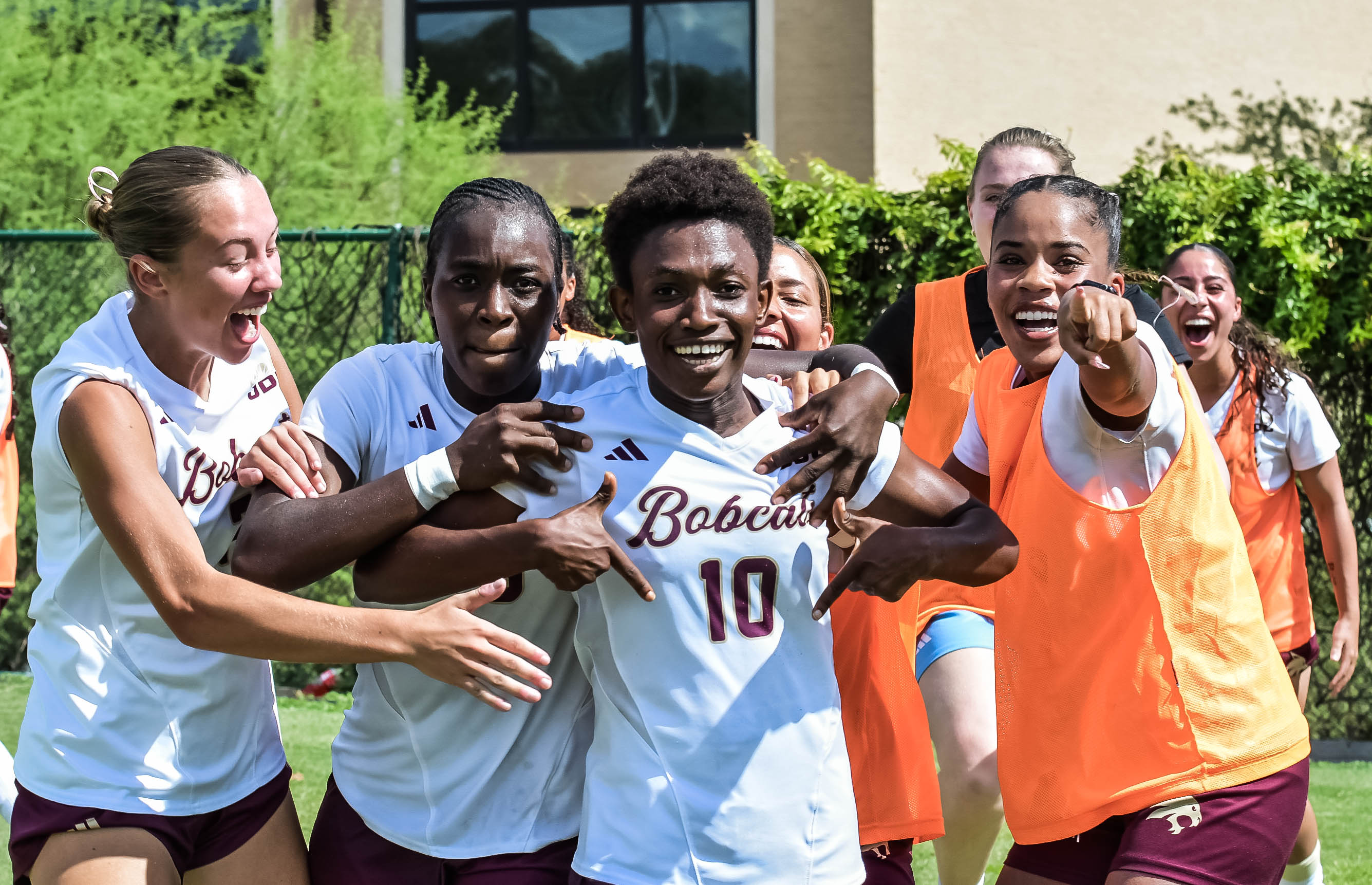 This is the women's soccer team celebrating.